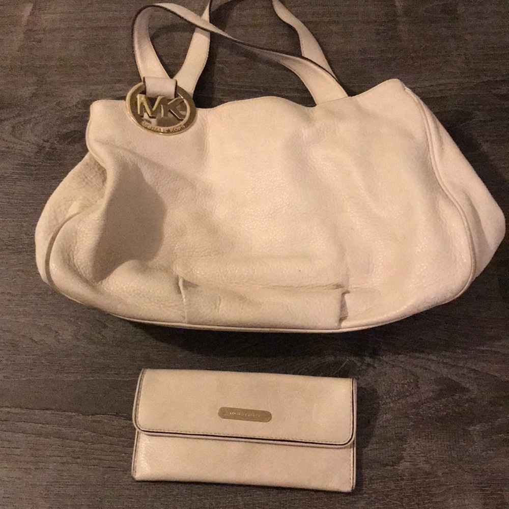 White Michael Kors purse and wallet set